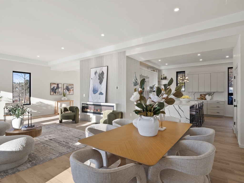 225 Walnut Street Saugus, MA 01906 - Photo 10 of 42 a living room with furniture kitchen view and a dining table
