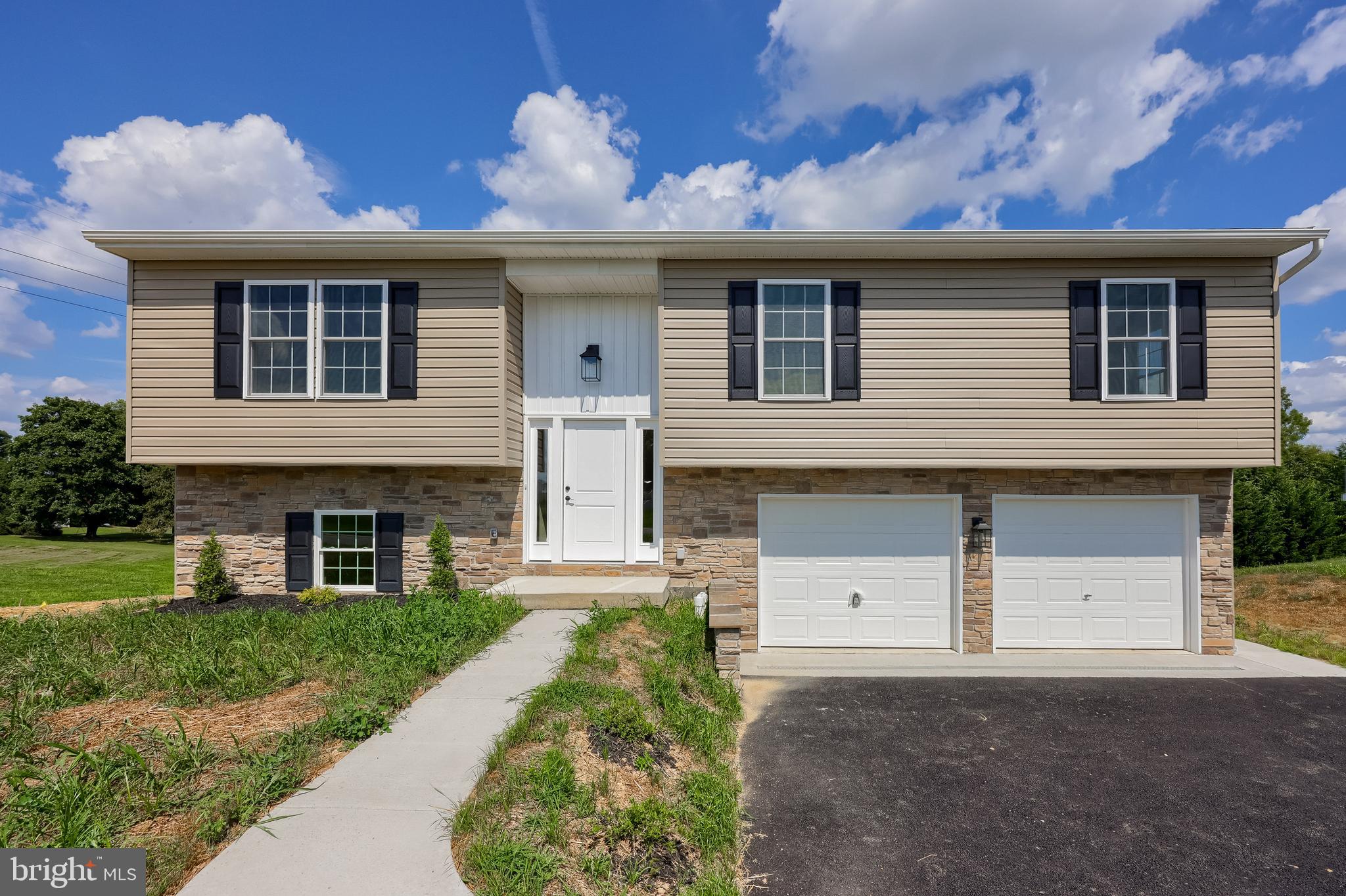 6030 Deborah Drive Spring Grove, PA 17362 - Photo 1 of 34 a front view of house with yard