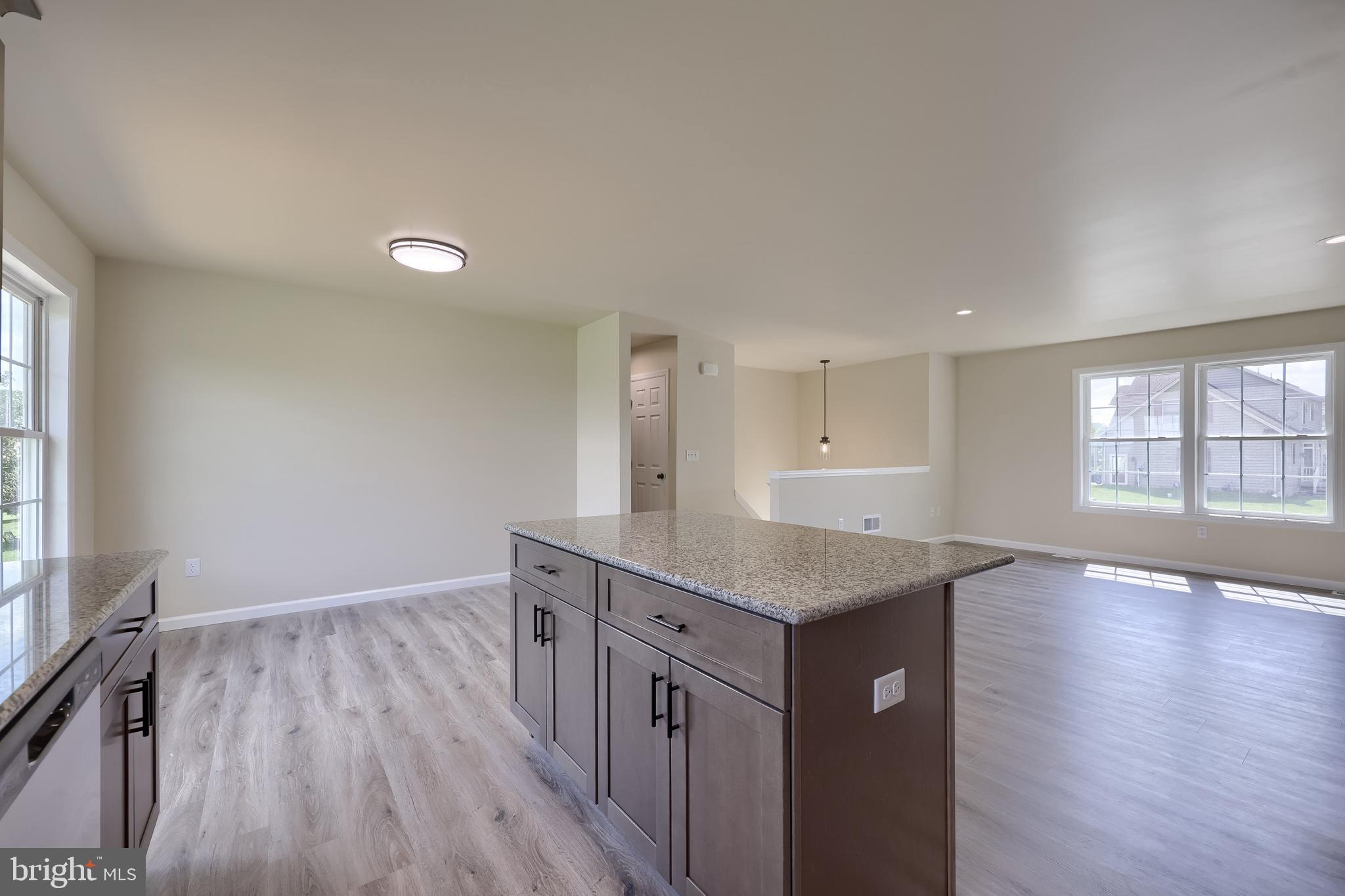 6030 Deborah Drive Spring Grove, PA 17362 - Photo 17 of 34 a kitchen with a wooden floor and window