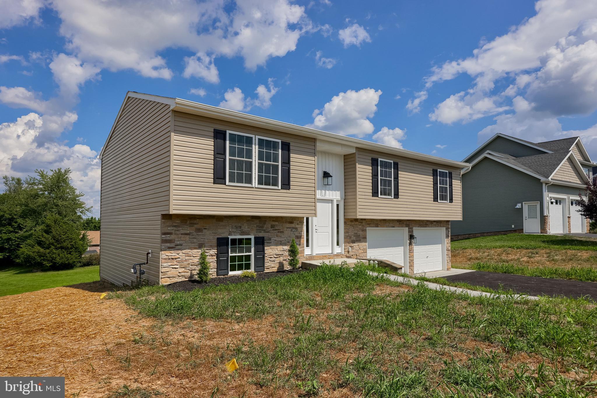6030 Deborah Drive Spring Grove, PA 17362 - Photo 33 of 34 a view of a house with a yard