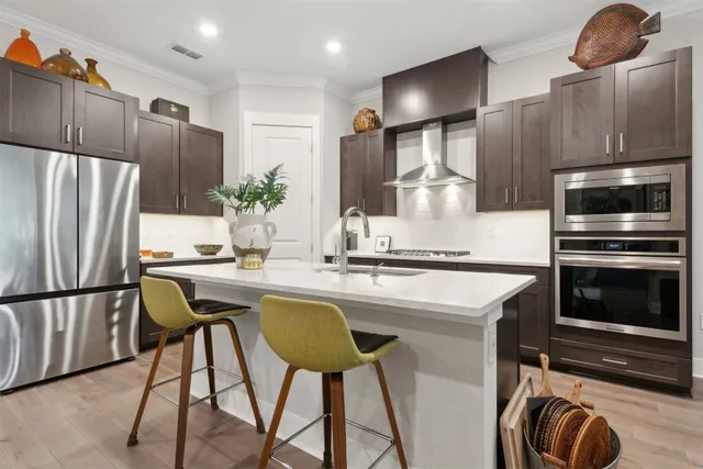 a shelf with books and knick knacks on it