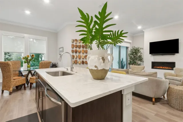a view of a workspace room with wooden floor