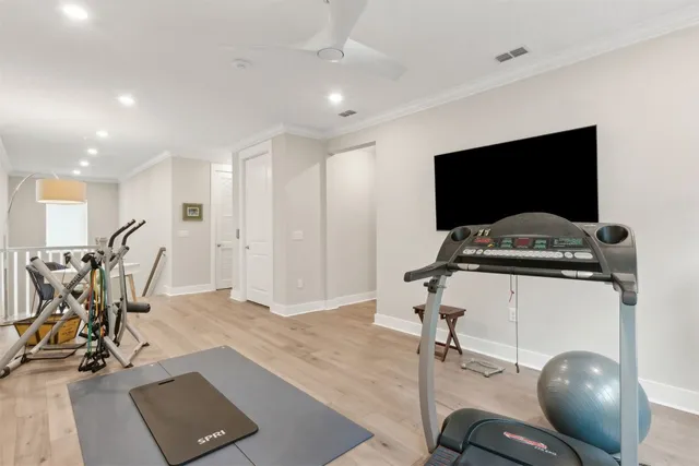 a bathroom with a granite countertop toilet sink and mirror