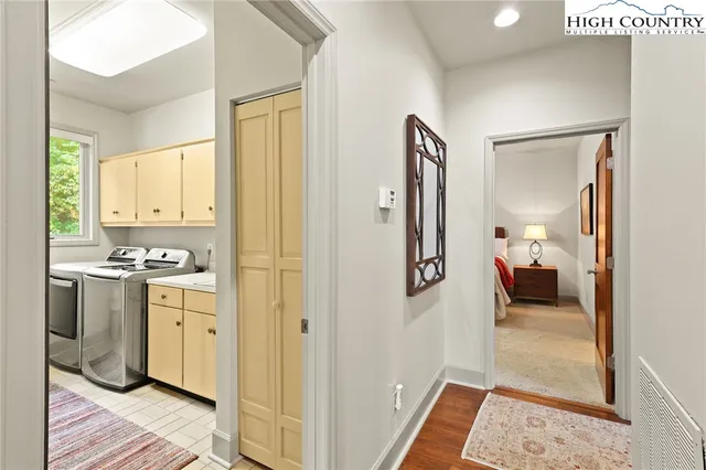 a en suite bathroom with a sink and a mirror