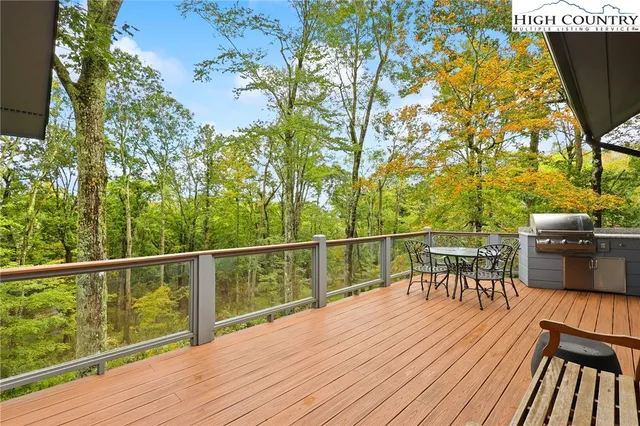 a view of a balcony with chairs