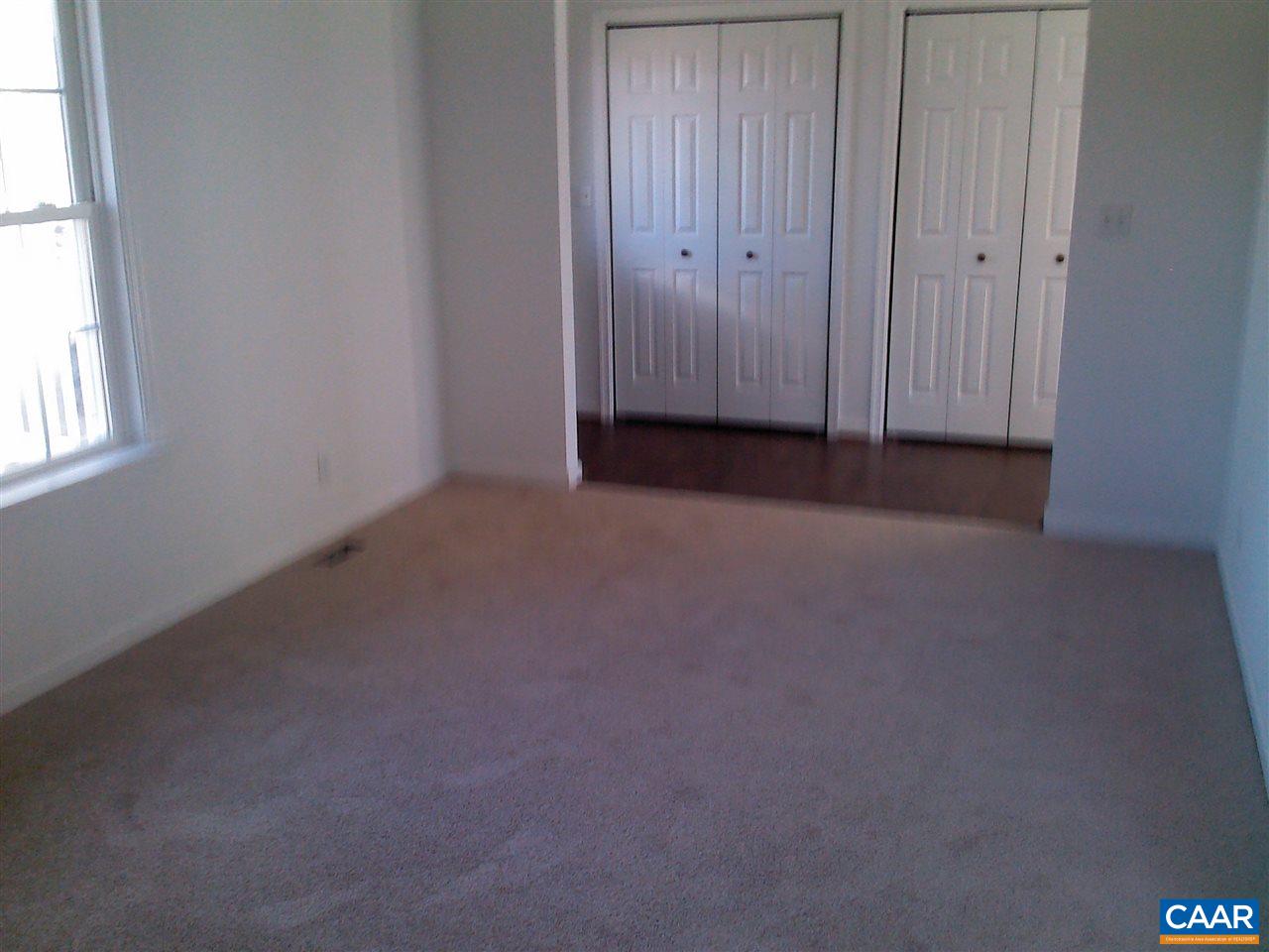 130 Jacoby Road Louisa, VA 23093 - Photo 9 of 12 an empty room with windows