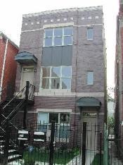 a front view of a building with glass windows
