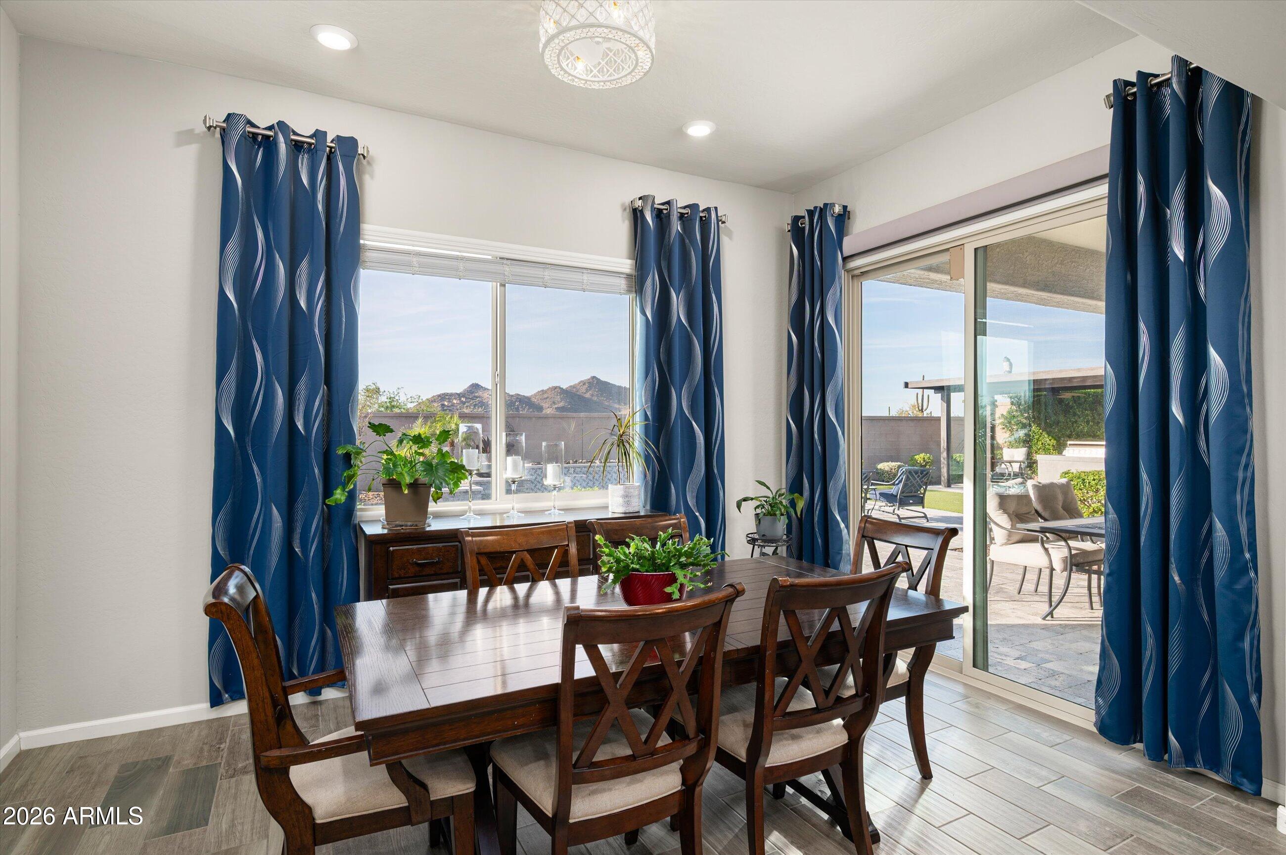 6406 Copper Springs Road Phoenix, AZ 85083 - Photo 15 of 59 a view of a dining room with furniture window and outside view