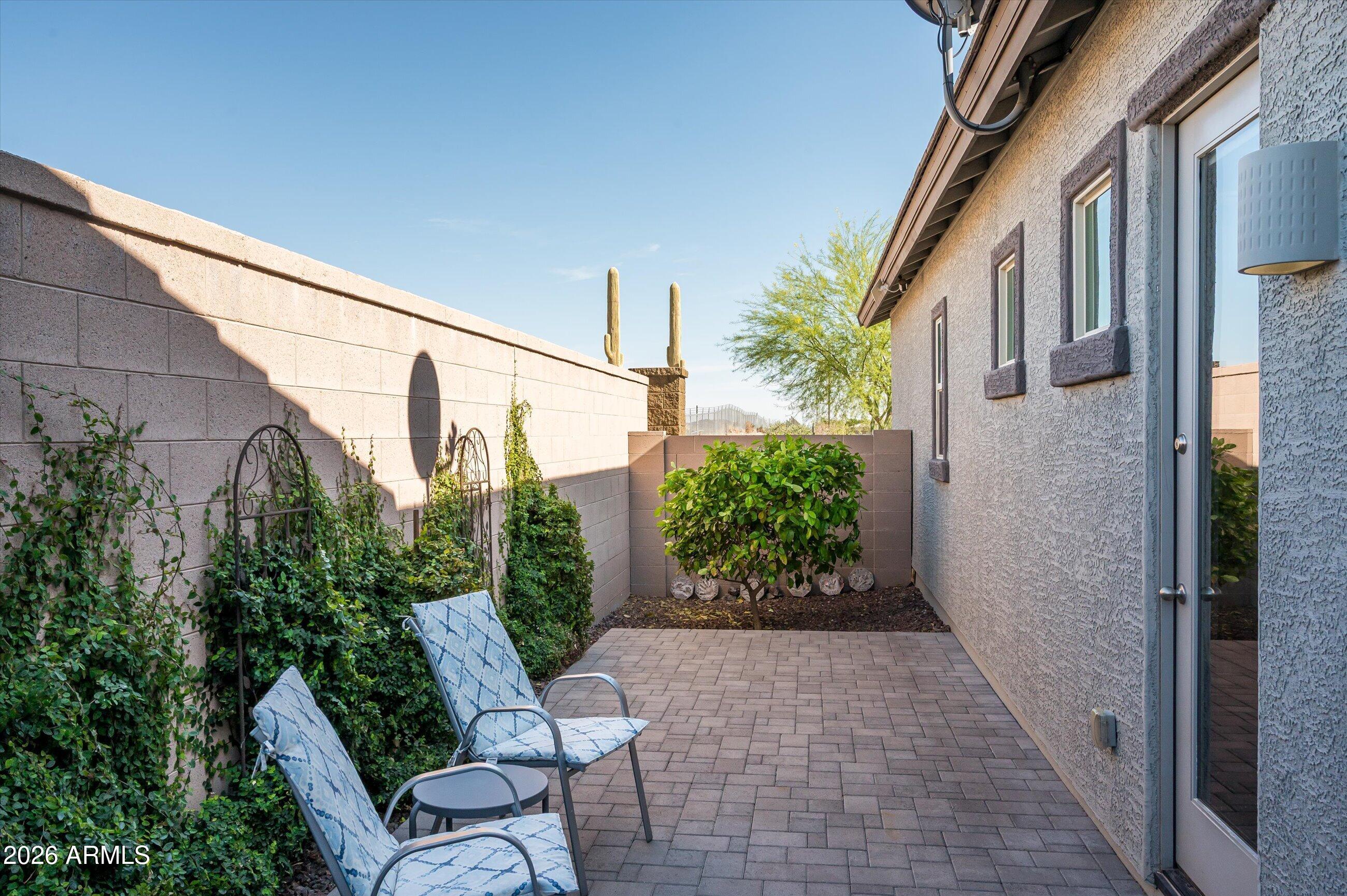 6406 Copper Springs Road Phoenix, AZ 85083 - Photo 26 of 59 a view of balcony with chairs and potted plants