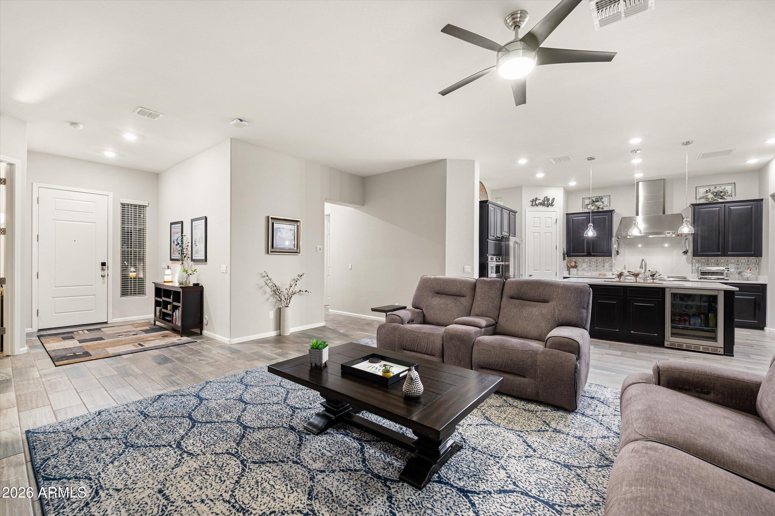 6406 Copper Springs Road Phoenix, AZ 85083 - Photo 7 of 59 a living room with furniture and kitchen view