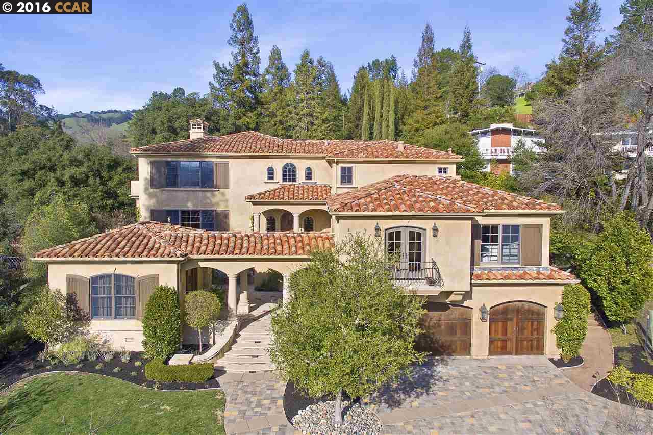 1141 Vallecito Court Lafayette, CA 94549 - Photo 1 of 1 a front view of a house with a yard and garage