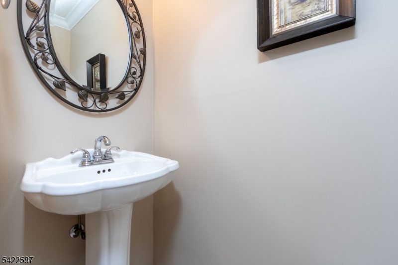 504 Reading Circle Bridgewater, NJ 08807 - Photo 18 of 35 a bathroom with a sink and a mirror