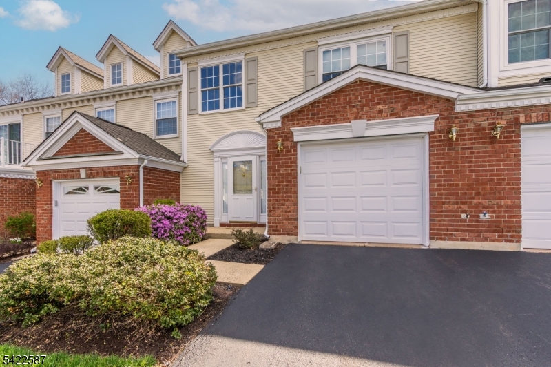 504 Reading Circle Bridgewater, NJ 08807 - Photo 2 of 35 a front view of a house with a yard