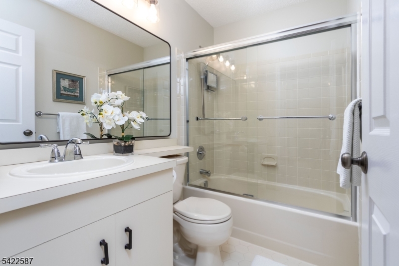504 Reading Circle Bridgewater, NJ 08807 - Photo 26 of 35 a bathroom with a sink toilet and shower