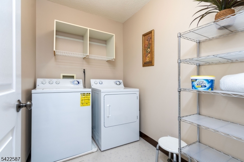 504 Reading Circle Bridgewater, NJ 08807 - Photo 27 of 35 a utility room with dryer and washer