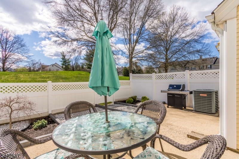 504 Reading Circle Bridgewater, NJ 08807 - Photo 30 of 35 a table and chairs with the view of lake
