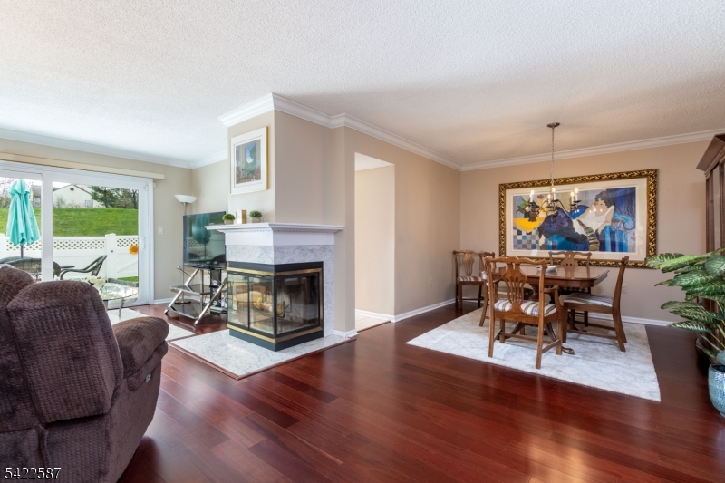 504 Reading Circle Bridgewater, NJ 08807 - Photo 7 of 35 a living room with furniture a fireplace and a window