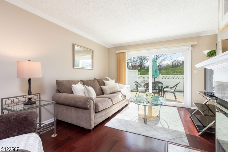 504 Reading Circle Bridgewater, NJ 08807 - Photo 8 of 35 a living room with furniture and a flat screen tv