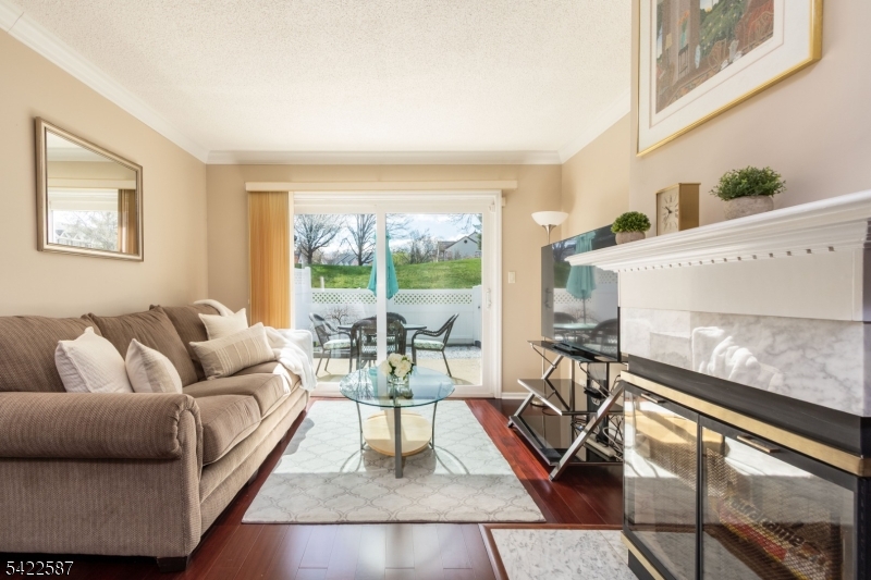 504 Reading Circle Bridgewater, NJ 08807 - Photo 9 of 35 a living room with furniture and a large window