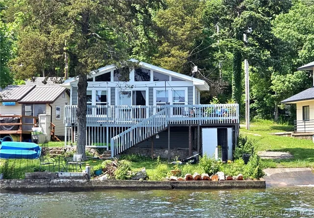 $317,000 | 28509 Playmor Beach Road, Rocky Mount, MO 65072