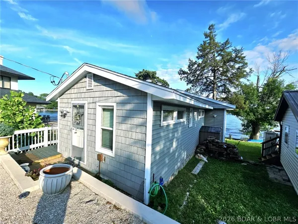 $299,000 | 28509 Playmor Beach Road, Rocky Mount, MO 65072