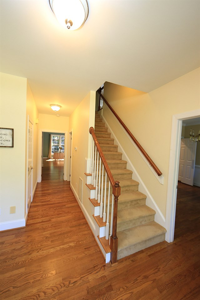 5921 Wild Orchid Trail Raleigh, NC 27613 - Photo 6 of 30 Welcoming foyer to greet your guests. Front and back stairwells. Entry/Foyer