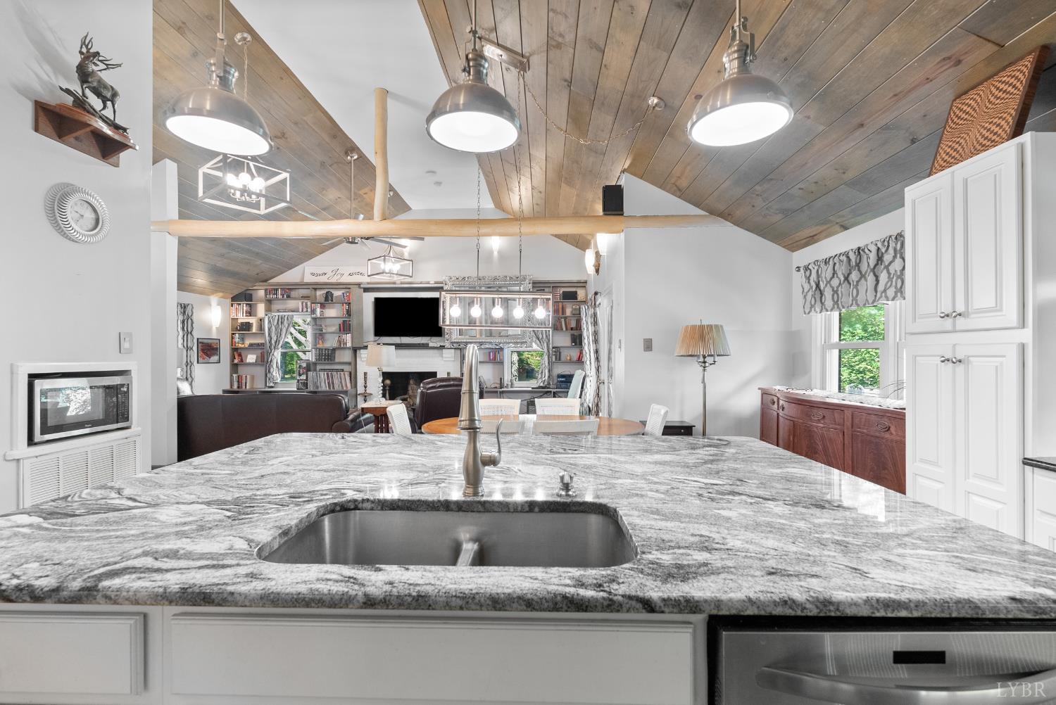 224 Sunset Drive Amherst, VA 24521 - Photo 12 of 34 a kitchen with kitchen island a sink and a stove