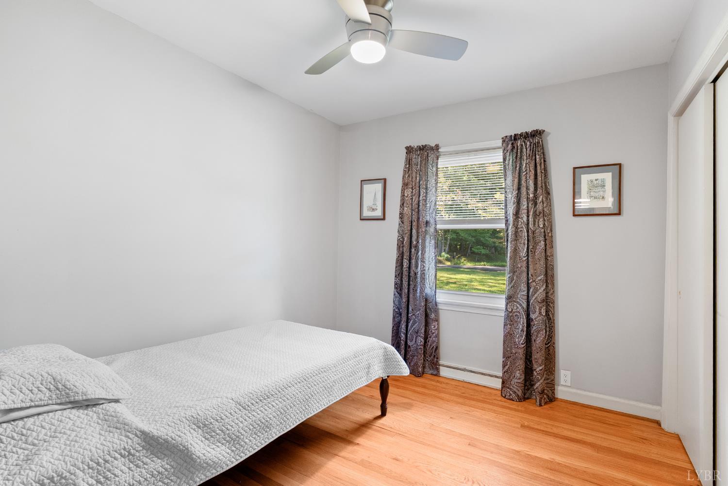 224 Sunset Drive Amherst, VA 24521 - Photo 14 of 34 a bedroom with a bed and a window