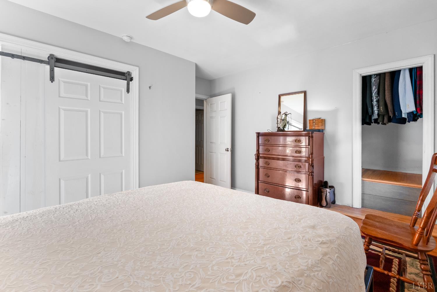 224 Sunset Drive Amherst, VA 24521 - Photo 17 of 34 a bedroom with a bed and dresser
