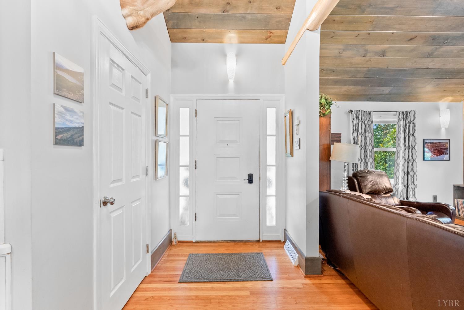 224 Sunset Drive Amherst, VA 24521 - Photo 2 of 34 a view of a hallway with bathroom and front door