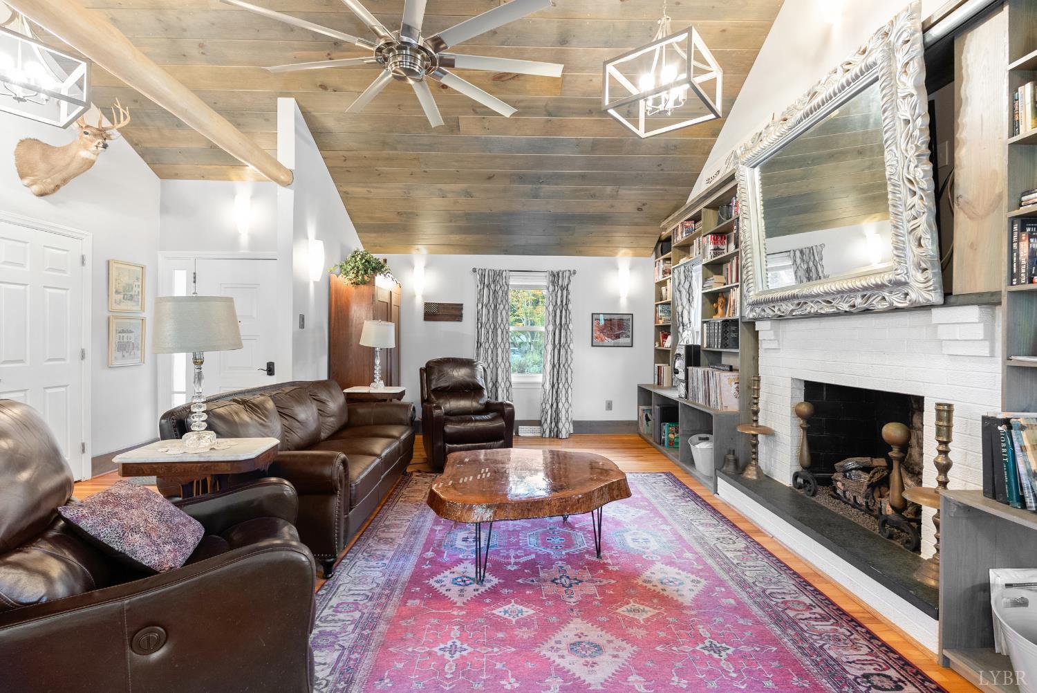 224 Sunset Drive Amherst, VA 24521 - Photo 5 of 34 a living room with furniture and a fireplace
