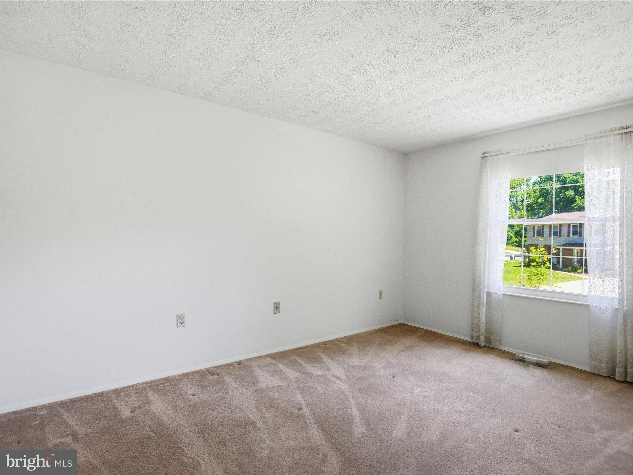 6314 West Vein Road Bowie, MD 20720 - Photo 17 of 28 an empty room with windows