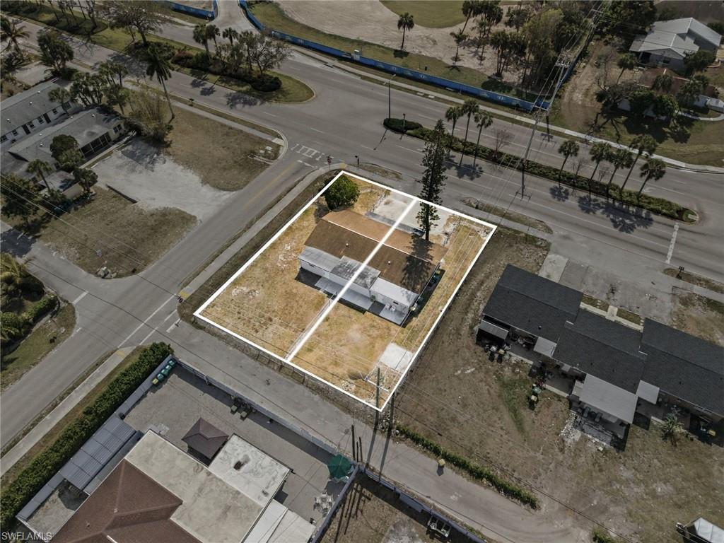 4375 Golden Gate Parkway Naples, FL 34116 - Photo 4 of 34 Aerial perspective of suburban area featuring property parcel outlined