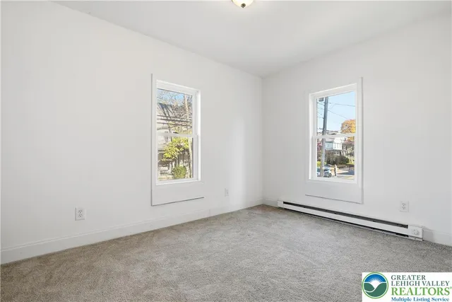 an empty room with a window