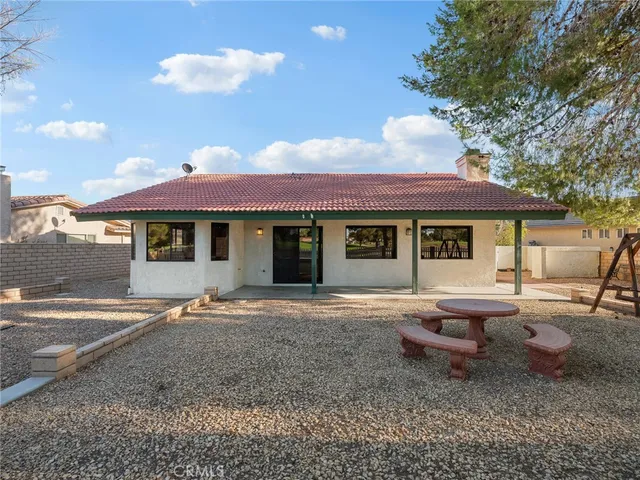 a front view of a house with garage