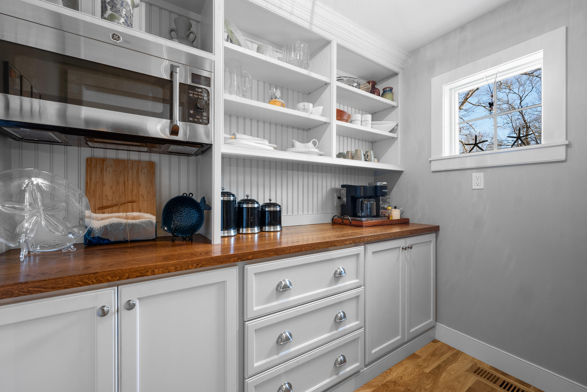6 Bunker Circle Sandwich, MA 02563 - Photo 13 of 43 a kitchen with stainless steel appliances a cabinets and wooden floor