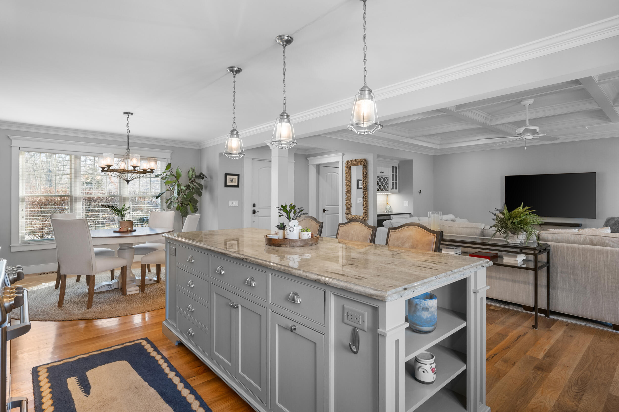 6 Bunker Circle Sandwich, MA 02563 - Photo 8 of 43 a kitchen with stainless steel appliances granite countertop a stove and a wooden floor