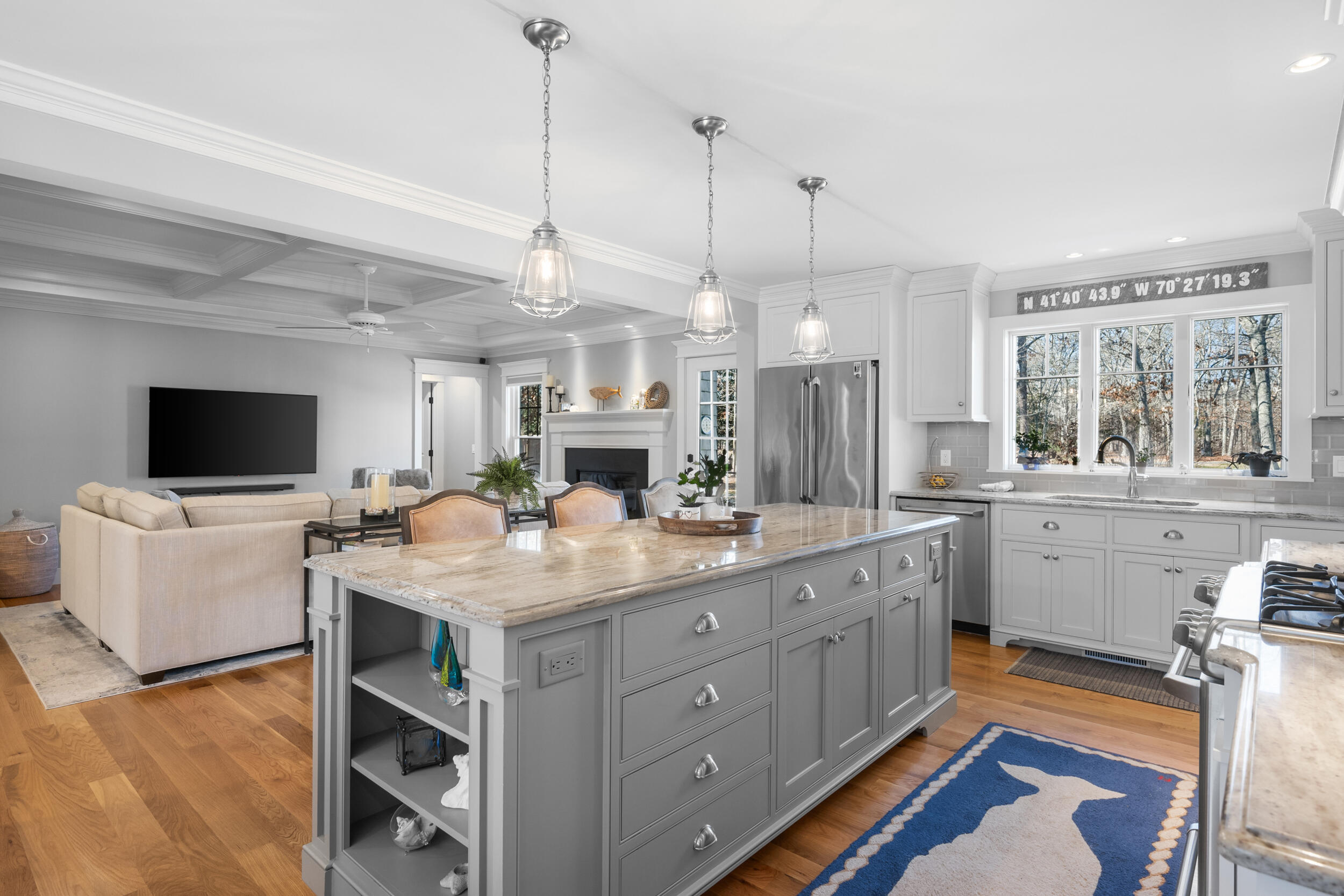 6 Bunker Circle Sandwich, MA 02563 - Photo 10 of 43 a kitchen with a stove a sink a center island and a window