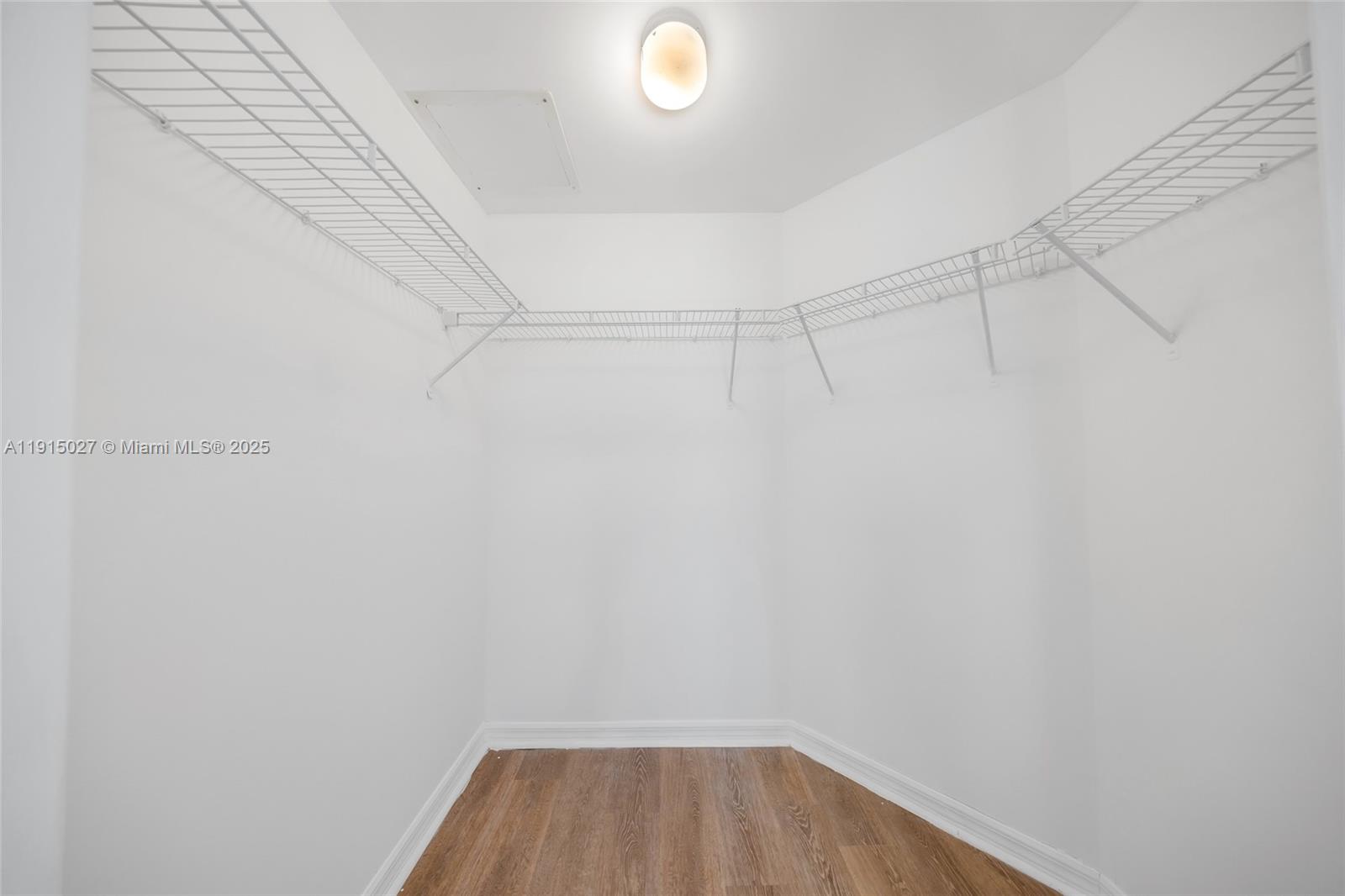 9172 Collins Avenue, Unit 212 Surfside, FL 33154 - Photo 14 of 31 a view of a room with racks on the wall