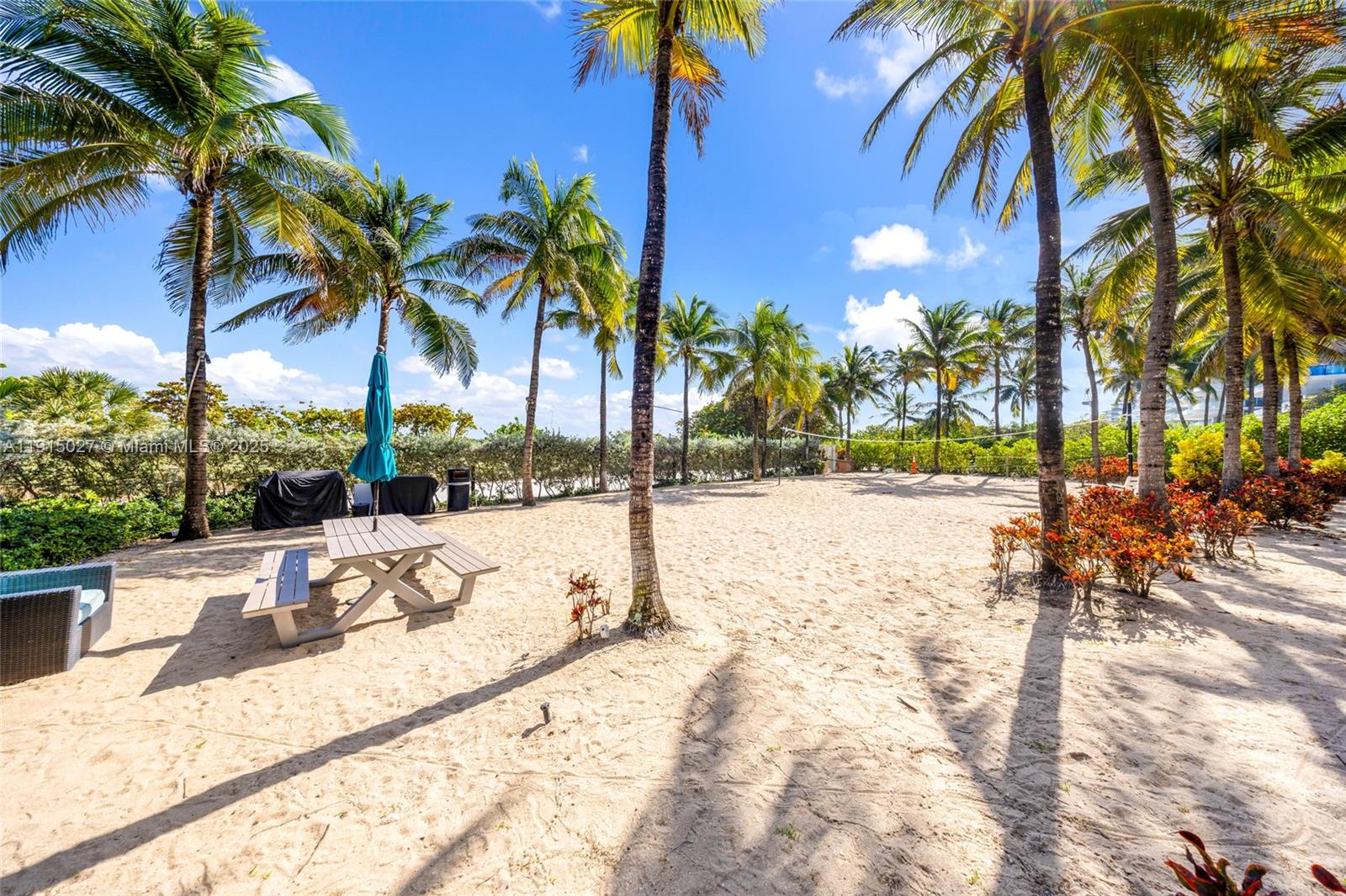 9172 Collins Avenue, Unit 212 Surfside, FL 33154 - Photo 29 of 31 a view of road with palm trees