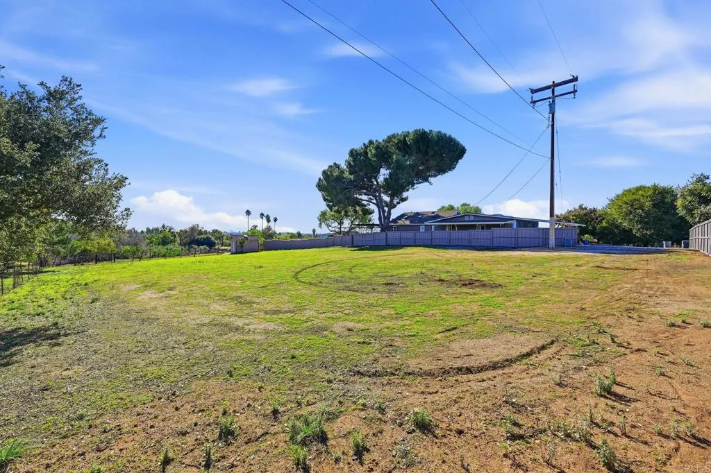 Sky Vista Fallbrook, CA 92028 - Photo 5 of 27 a view of a swimming pool with a yard