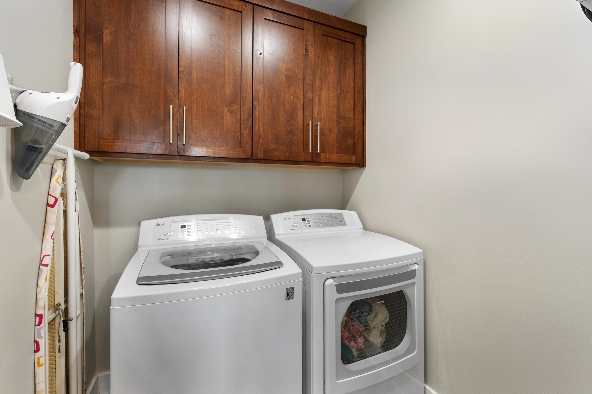 3302 Funston Street Austin, TX 78703 - Photo 26 of 36 Laundry room with separate washer and dryer
