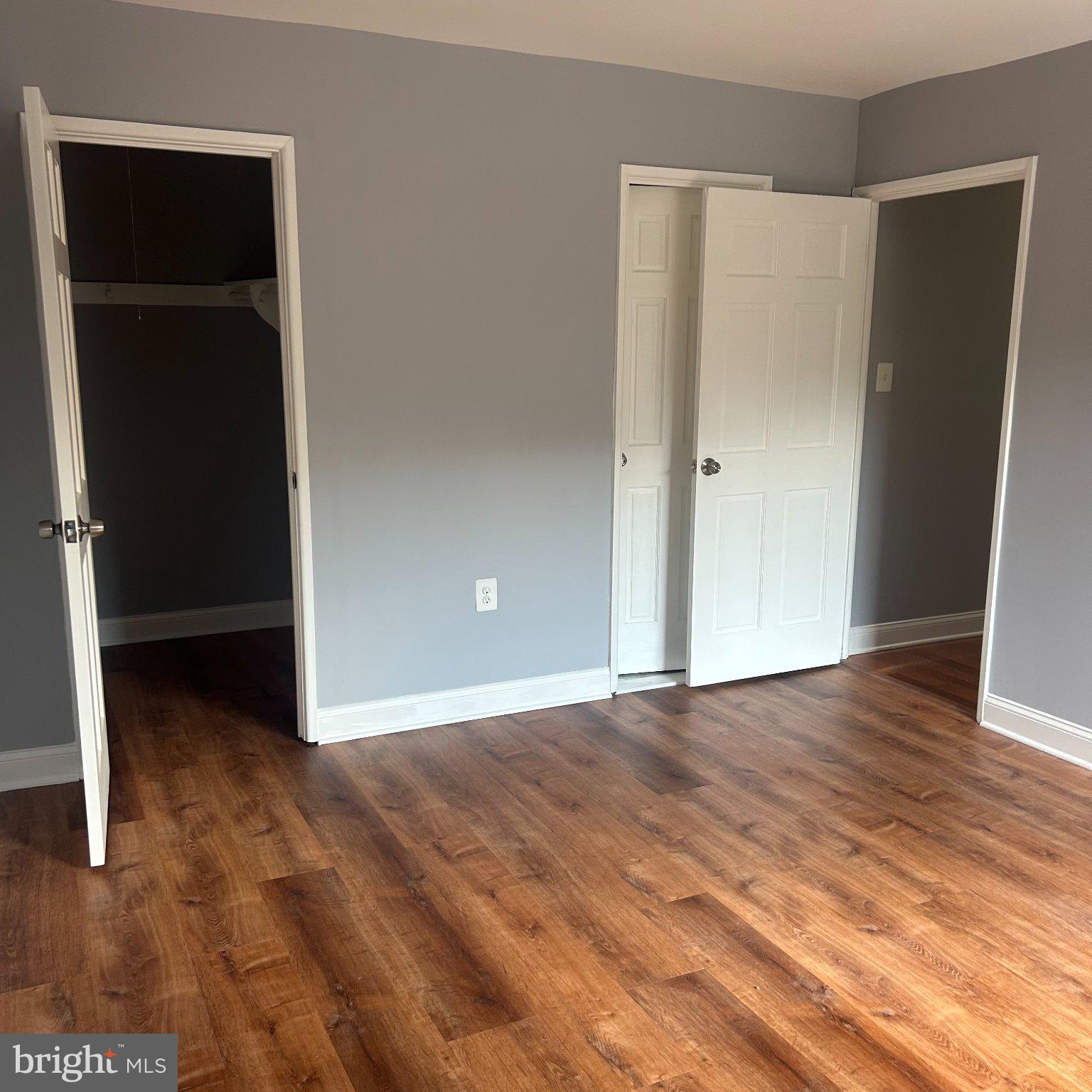 10549 Twin Rivers Road, Unit E1 Columbia, MD 21044 - Photo 10 of 20 bedroom 1 with walk in closet and bathroom