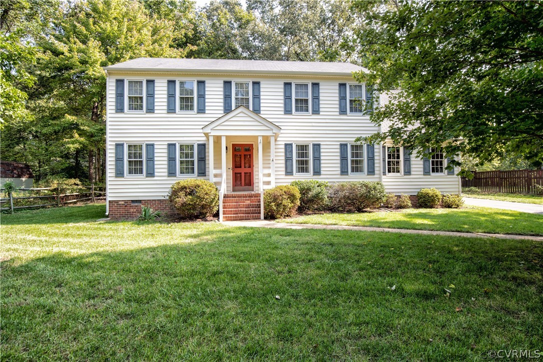 807 Dawnwood Road Midlothian, VA 23114 - Photo 1 of 37 a front view of a house with a garden