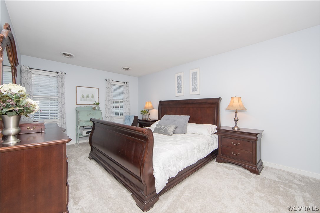 807 Dawnwood Road Midlothian, VA 23114 - Photo 15 of 37 a bedroom with a bed and a dresser