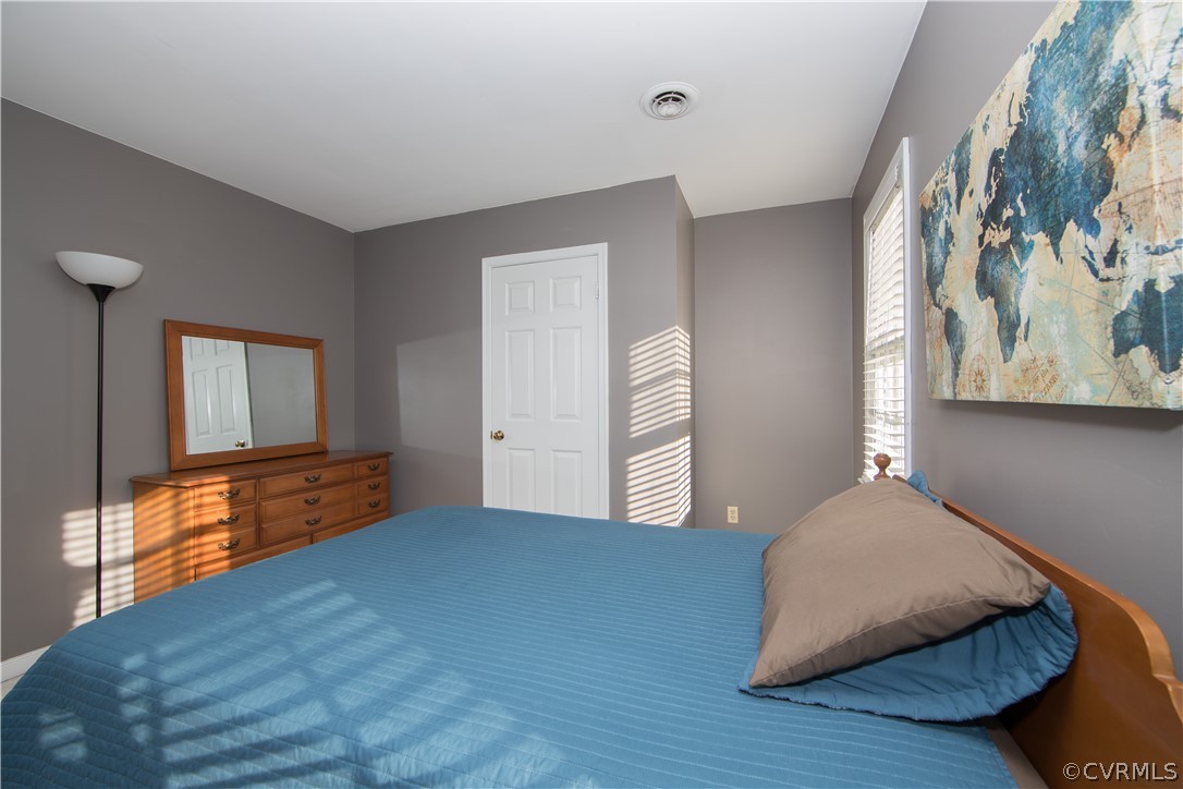 807 Dawnwood Road Midlothian, VA 23114 - Photo 23 of 37 a bedroom with a bed and window