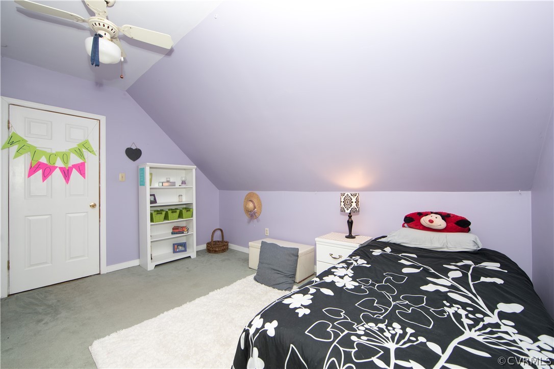 807 Dawnwood Road Midlothian, VA 23114 - Photo 25 of 37 a bedroom with a bed and dresser