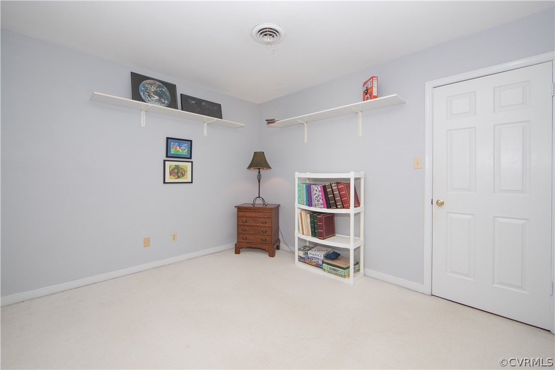 807 Dawnwood Road Midlothian, VA 23114 - Photo 27 of 37 a room with a book shelf