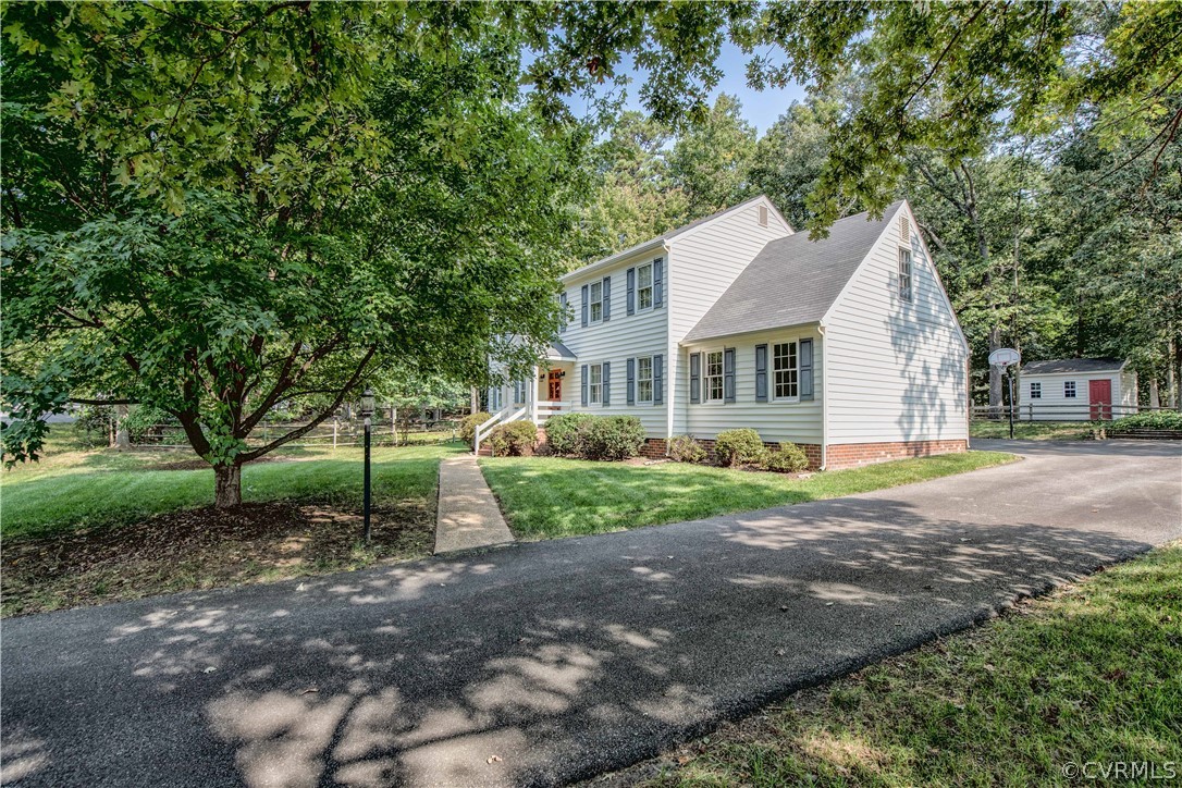 807 Dawnwood Road Midlothian, VA 23114 - Photo 32 of 37 a view of a house with a backyard