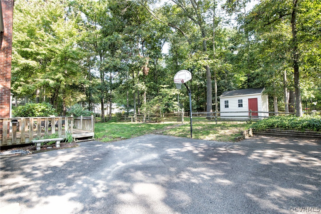 807 Dawnwood Road Midlothian, VA 23114 - Photo 33 of 37 a view of a house with a backyard and a tree